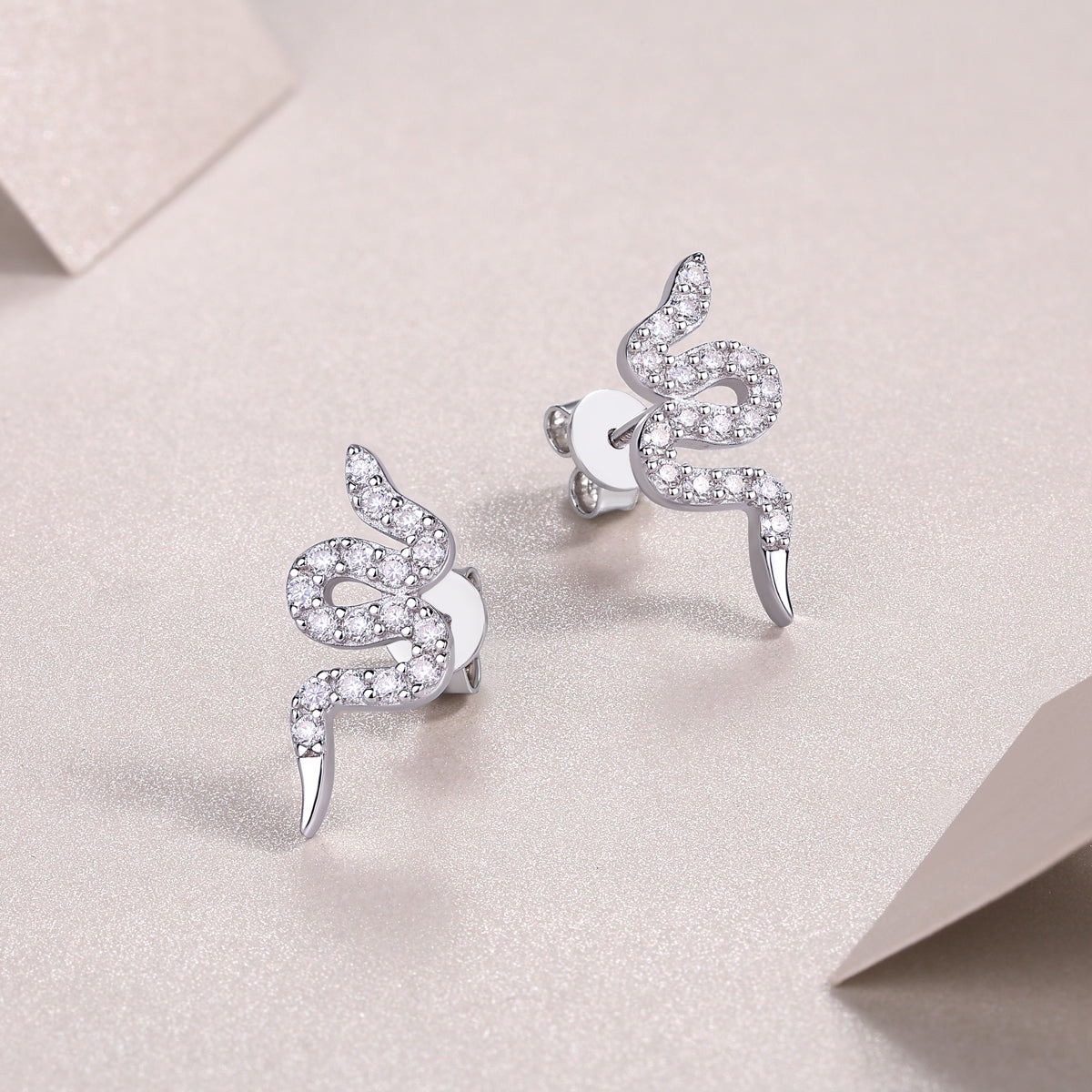Serpent Glow Stud Earrings